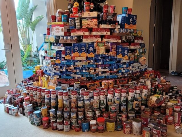 Wolverine Aquatics Club Donates More Than 2100 Cans for the Holidays
